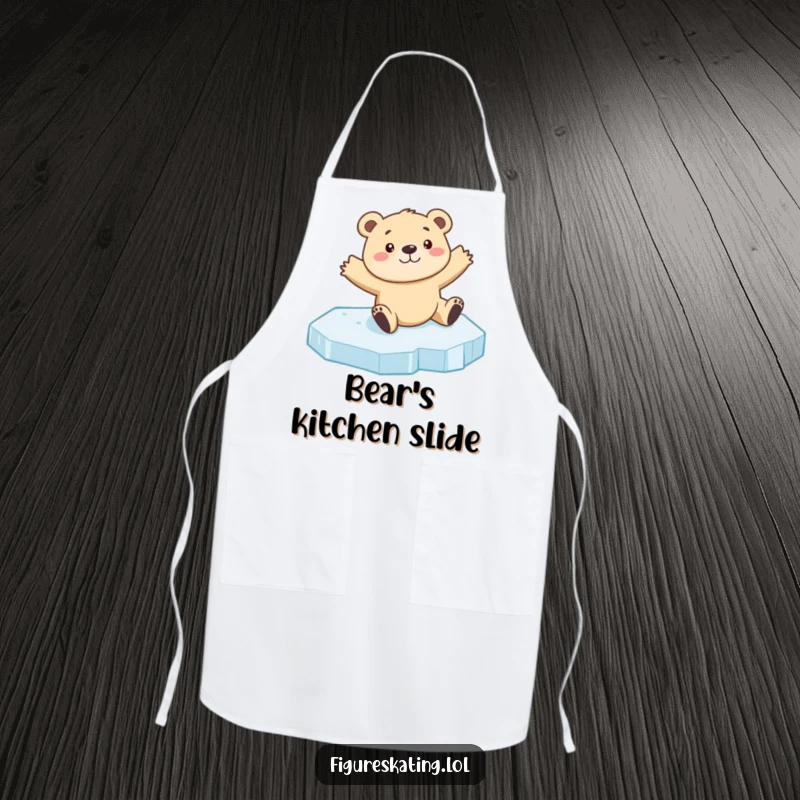 Funny bear cub ice skating apron showing a curious cub sliding on ice with arms outstretched, designed for humorous kitchen use.