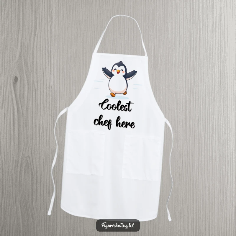 Funny apron with a delighted penguin gliding across ice with arms outstretched, adding a touch of playful winter cheer to cooking.