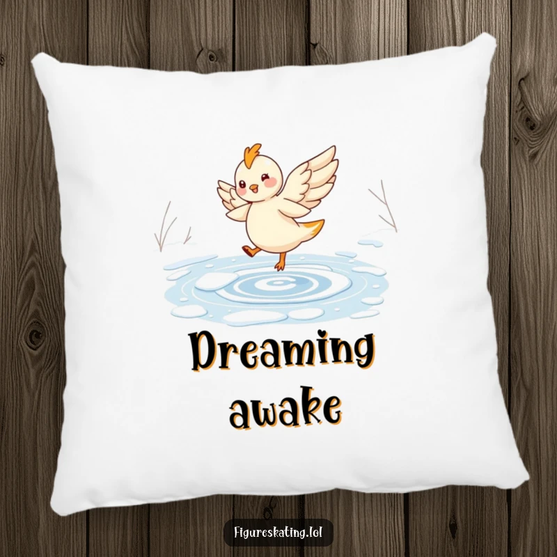Funny pillow featuring a cheerful, winged creature elegantly twirling on a frozen pond, adding comfort and fantasy.