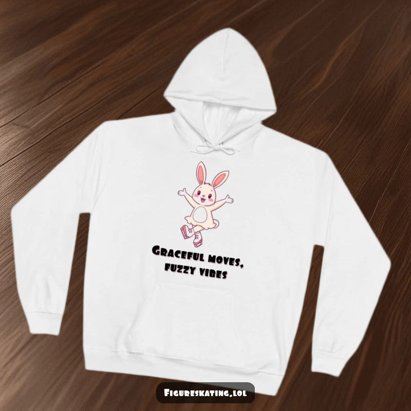 Funny hoodie depicting a cheerful bunny gracefully twirling on ice skates with arms elegantly extended, full of joy.