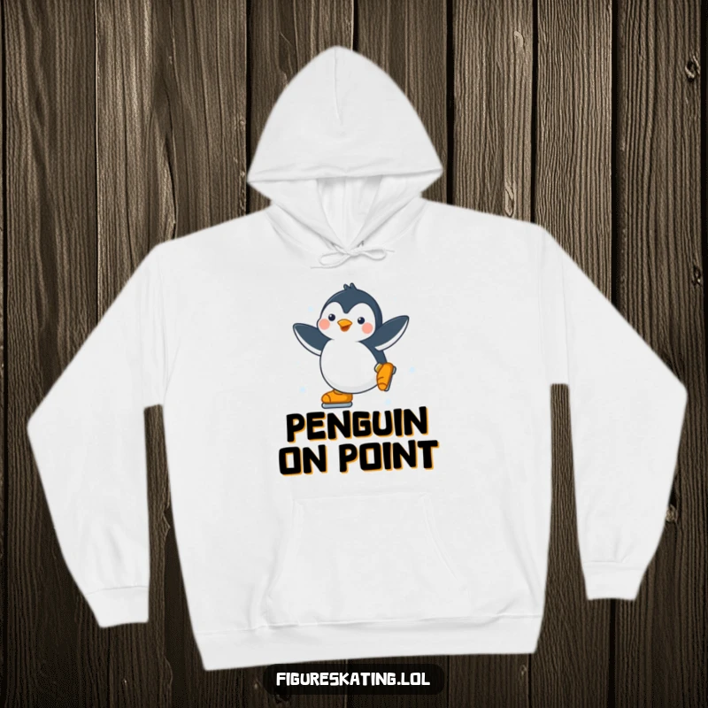 Funny Penguin Hoodie: Soft hoodie featuring a happy penguin gracefully spinning on ice skates, offering cozy athletic humor.