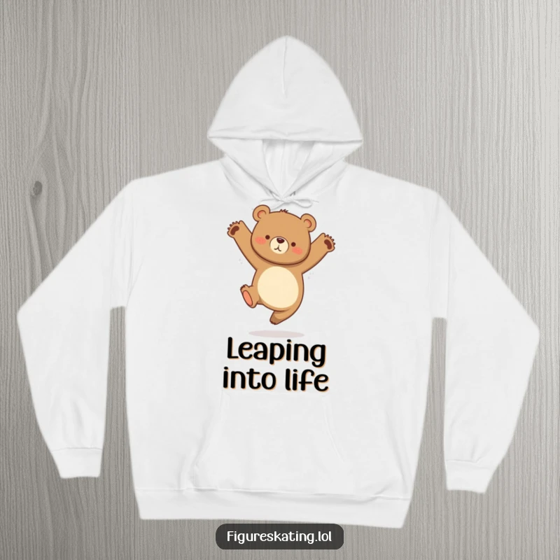 Funny hoodie showcasing a curious bear in a graceful jump with legs tucked, radiating playful energy.