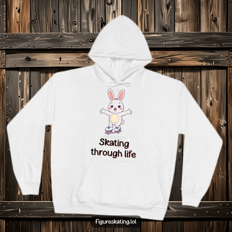 Funny hoodie depicting a happy bunny skating with arms wide open, offering cozy cheer and humorous delight.