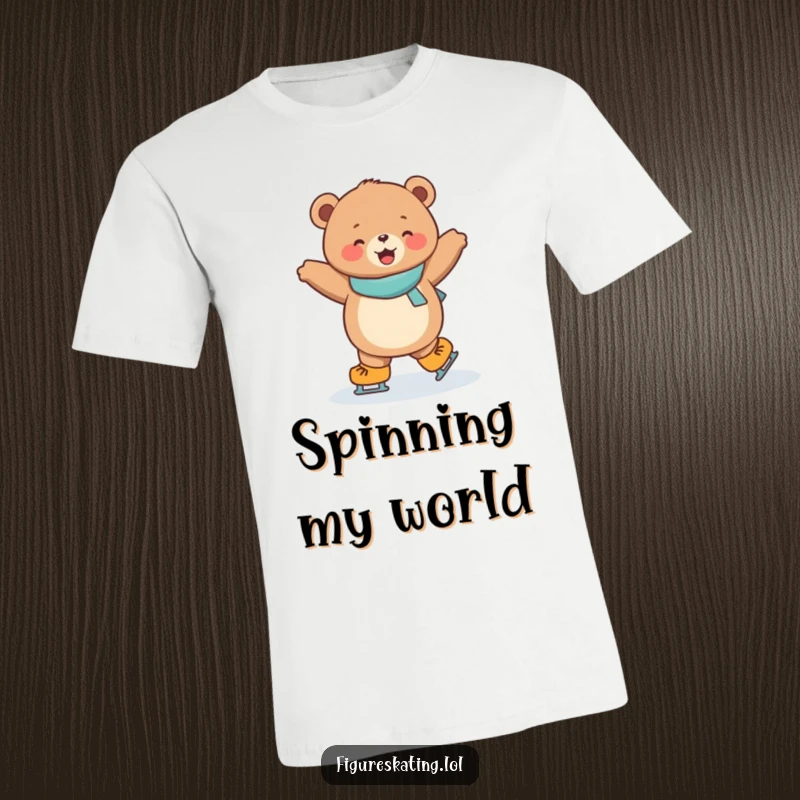 Funny T-shirt featuring a joyful, round bear cub elegantly spinning on ice skates, embodying winter delight.