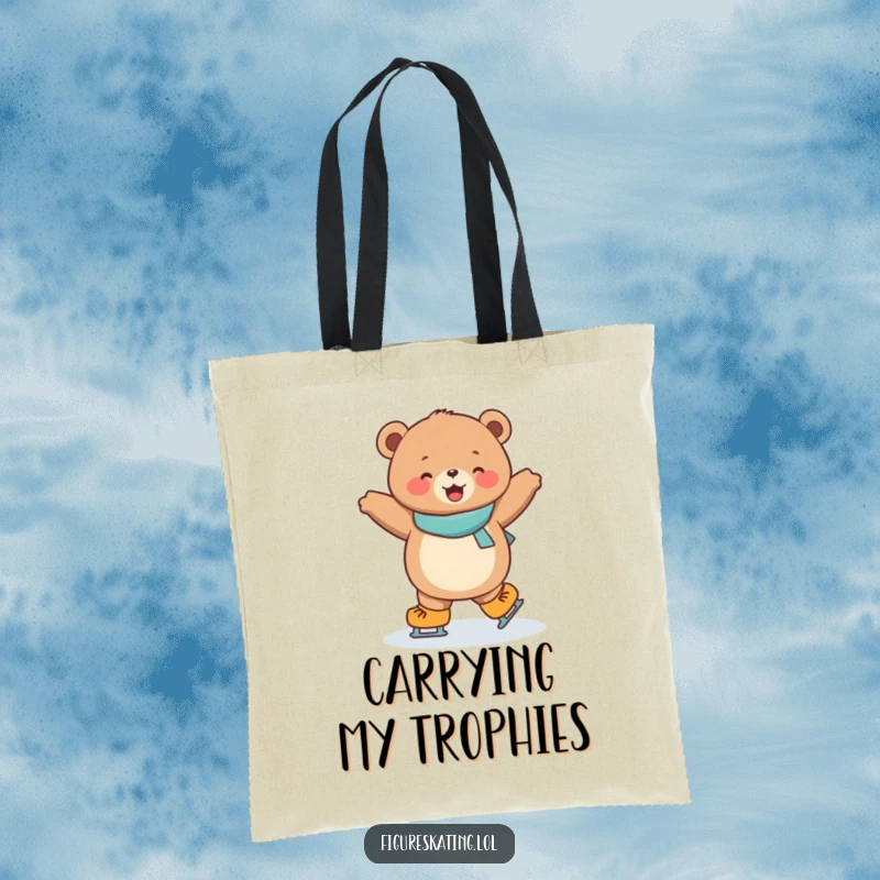 Funny tote bag with a joyful, round bear cub spinning on ice skates, perfect for carrying winter fun.